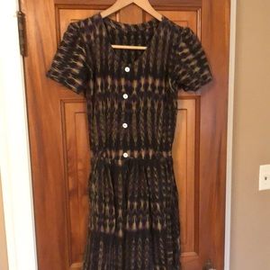 Tailored hippie dress, looks handmade.